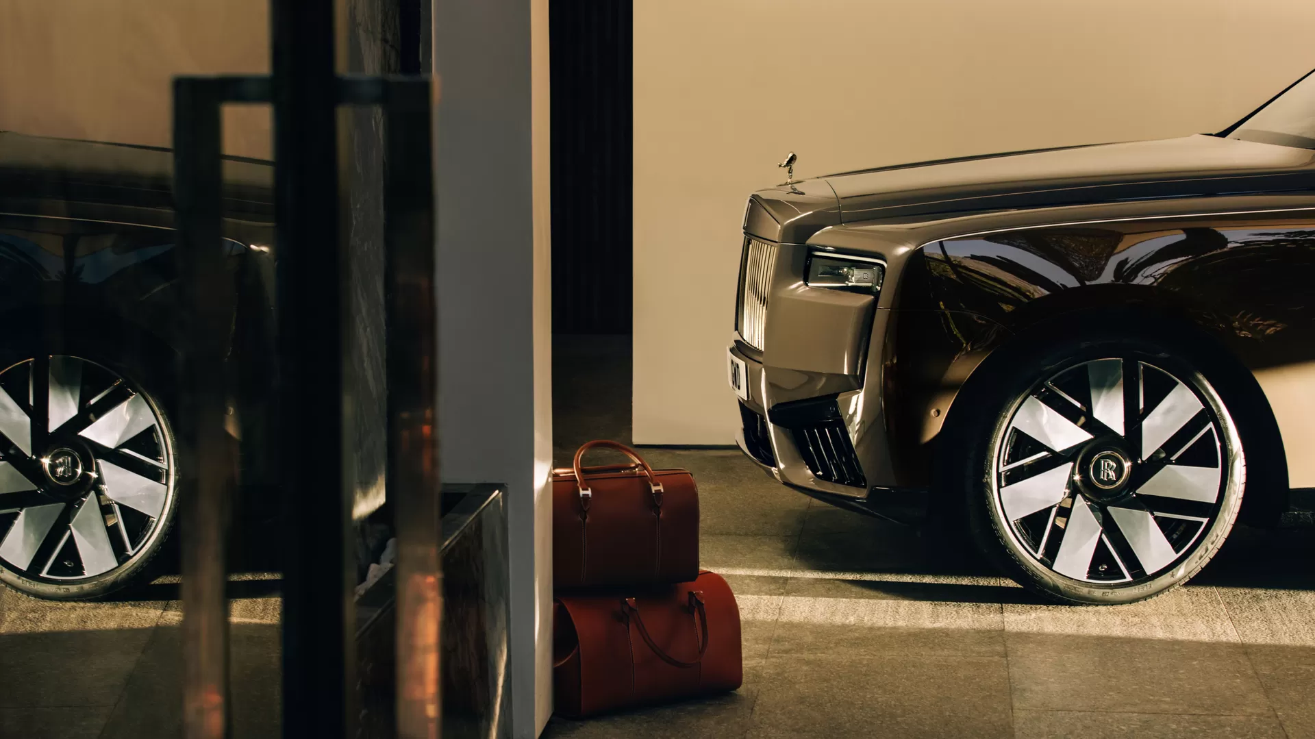Cullinan Series II parked next to the weekend bag