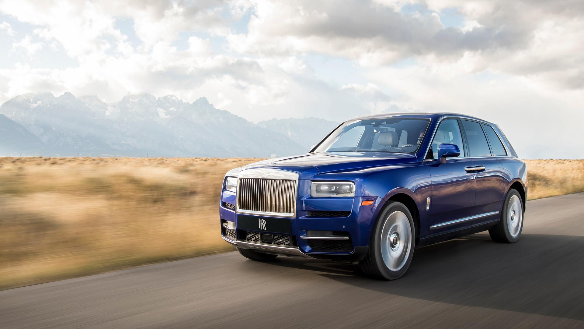 A blue Rolls-Royce car in the car