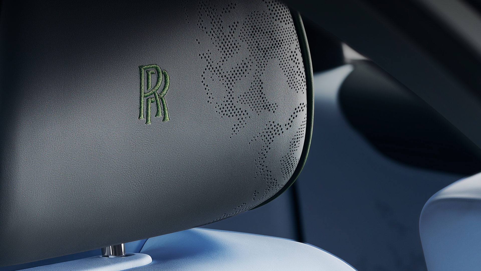 Ghost Extended SII headrest with green RR with webbed design styling.