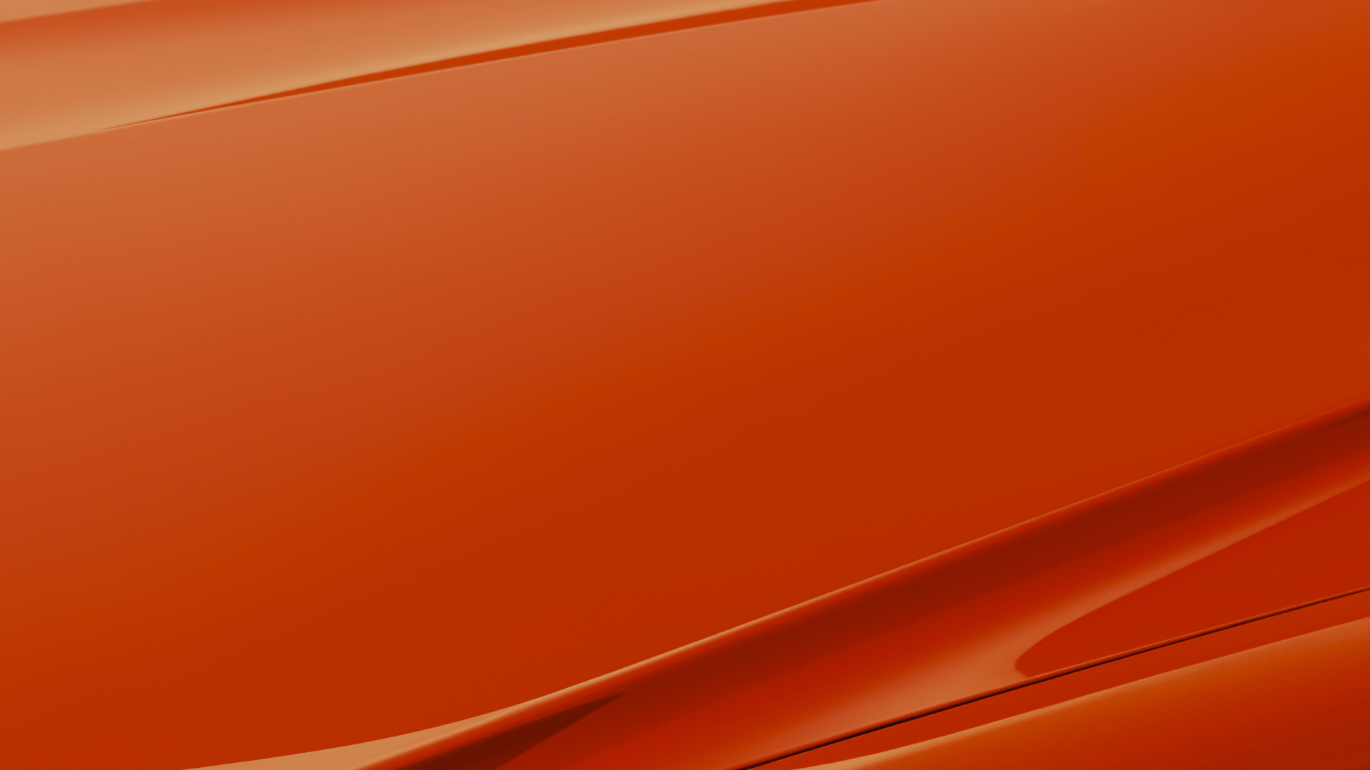ghost rolls royce 2021 Close view of the hood of a Rolls-Royce in orange
