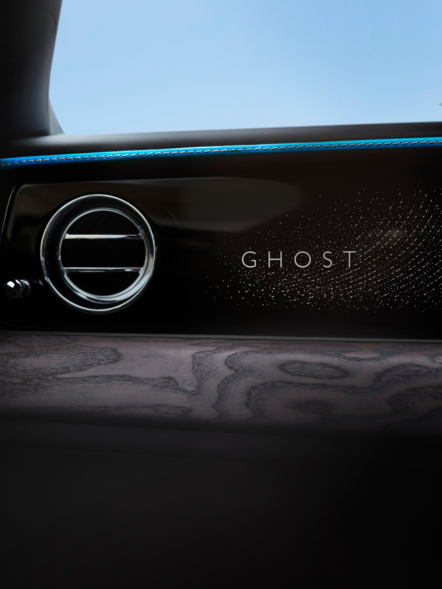 Close up of the Ghost Series II dashboard with blue, black, and brown accents.
