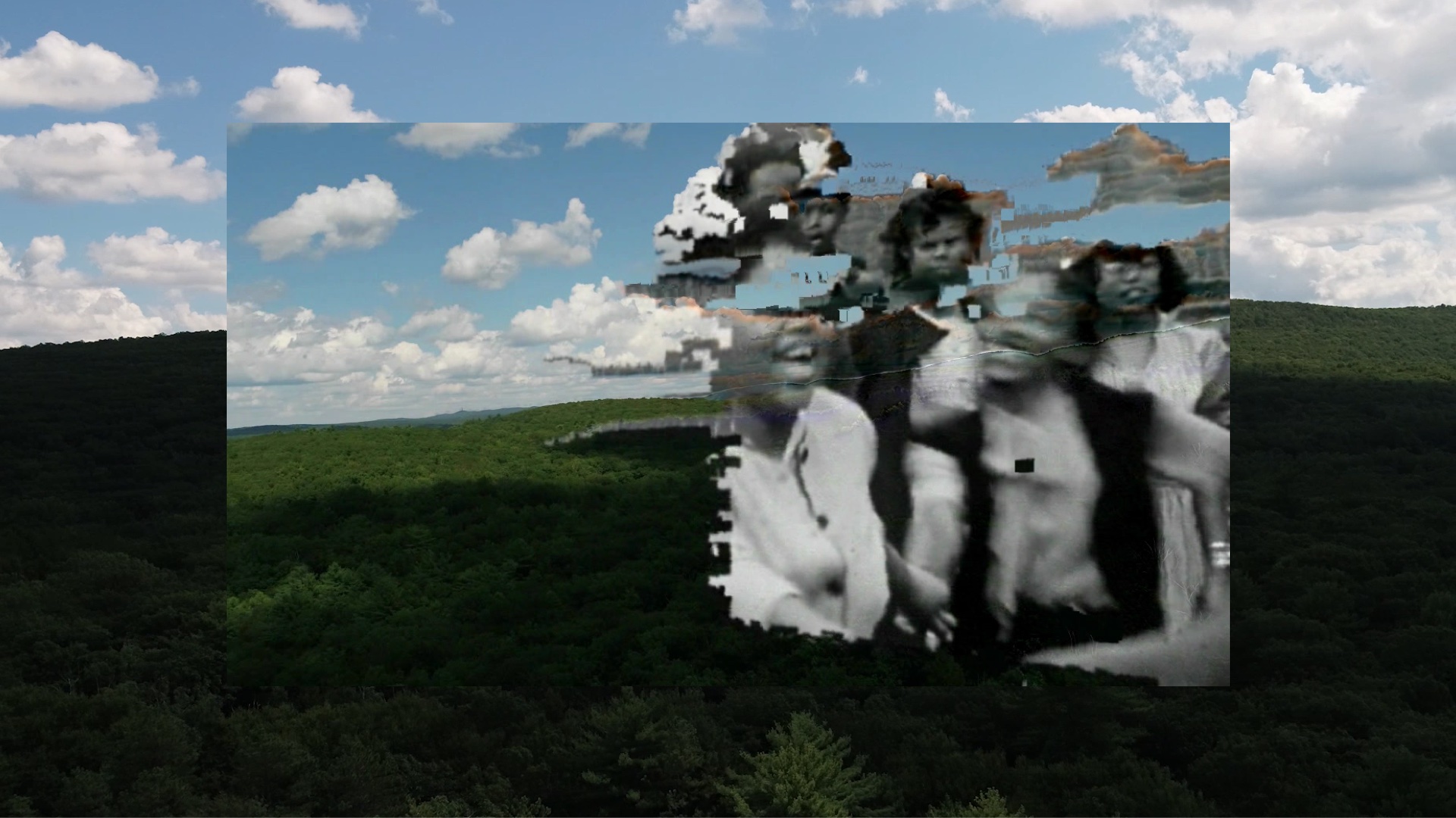 Sondra Perry, 2020, Lineage for a Phantom Zone, Courtesy Muse, the Rolls-Royce Art Programme. Image showing children laughing with a background of a rolling field and blue sky with clouds