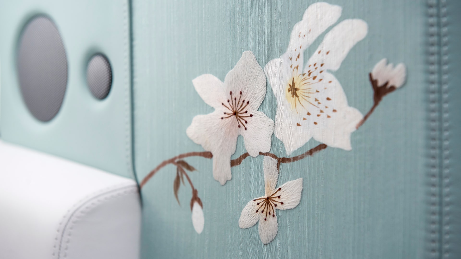 Detailed view of the interior door of the Phantom Serenity, featuring embroided flowers