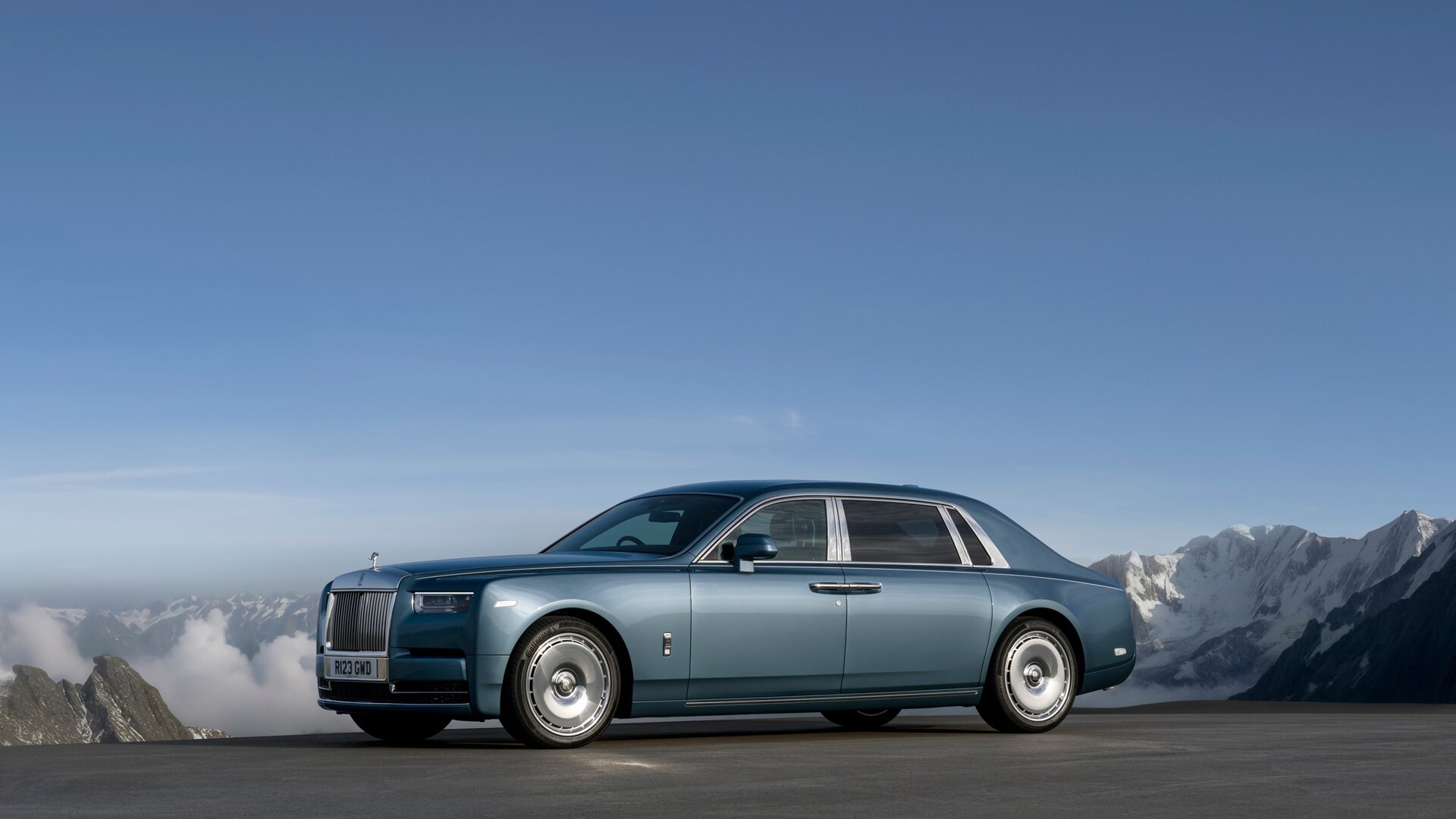 Front 3/4 of blue Phantom Extended on with a vast mountain-scape in the background.