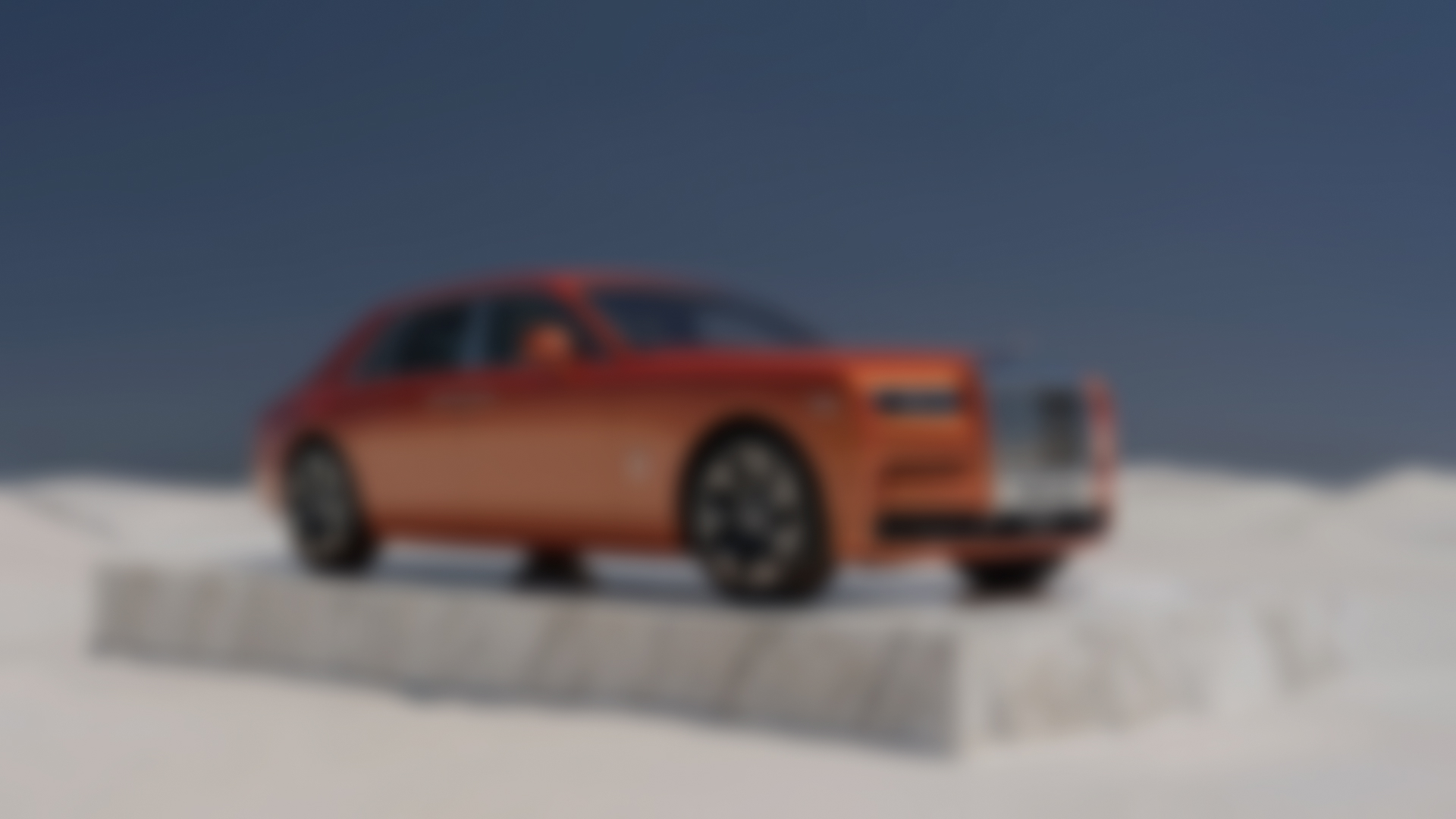 Front 3/4 of an Orange Phantom on a slab of marble in the middle of the desert 