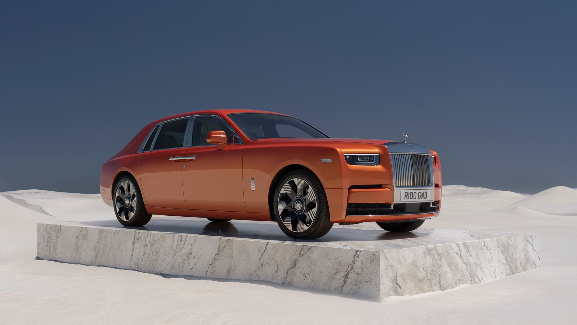 Front 3/4 of an Orange Phantom on a slab of marble in the middle of the desert 