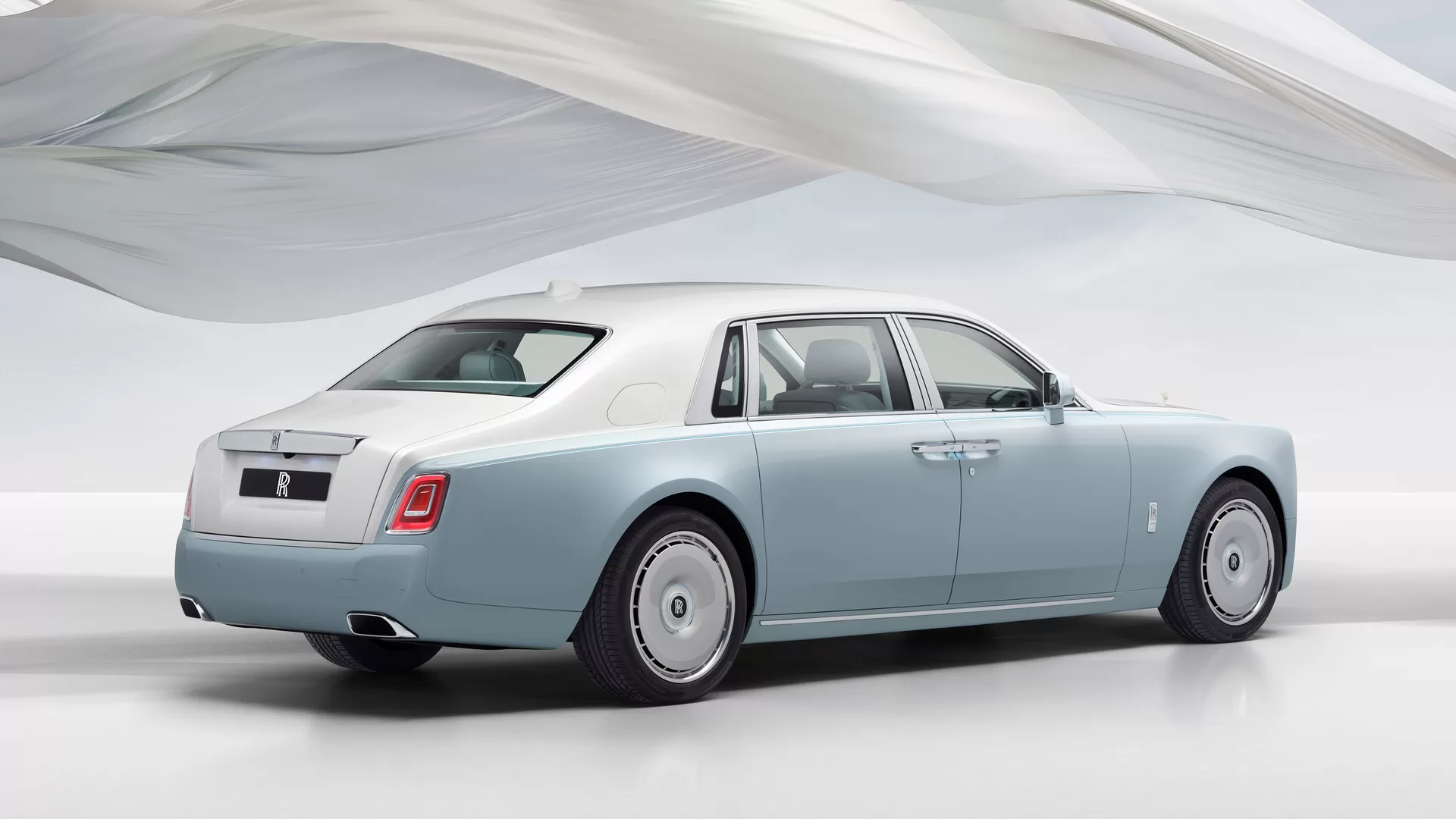 Phantom Scintilla side full car image sitting on a white platform. 