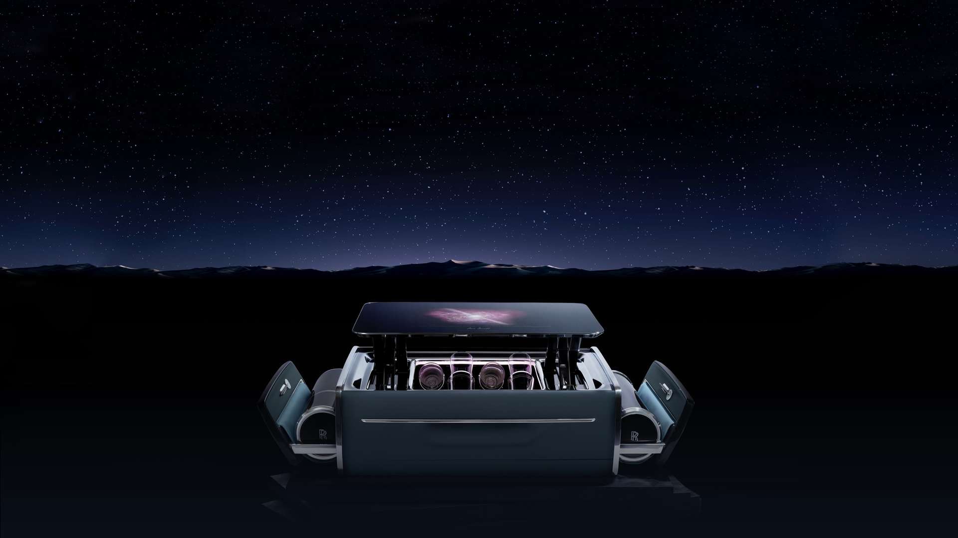Rolls-Royce Phantom Tempus Champagne Chest unfolded to reveal serving tray and drawers, with a starlit night-sky background