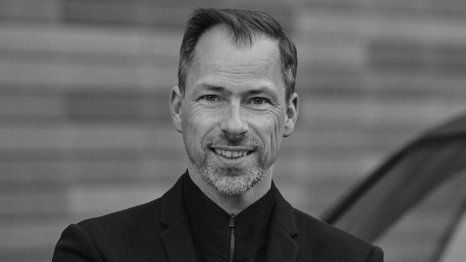 A profile shot of Anders Warming