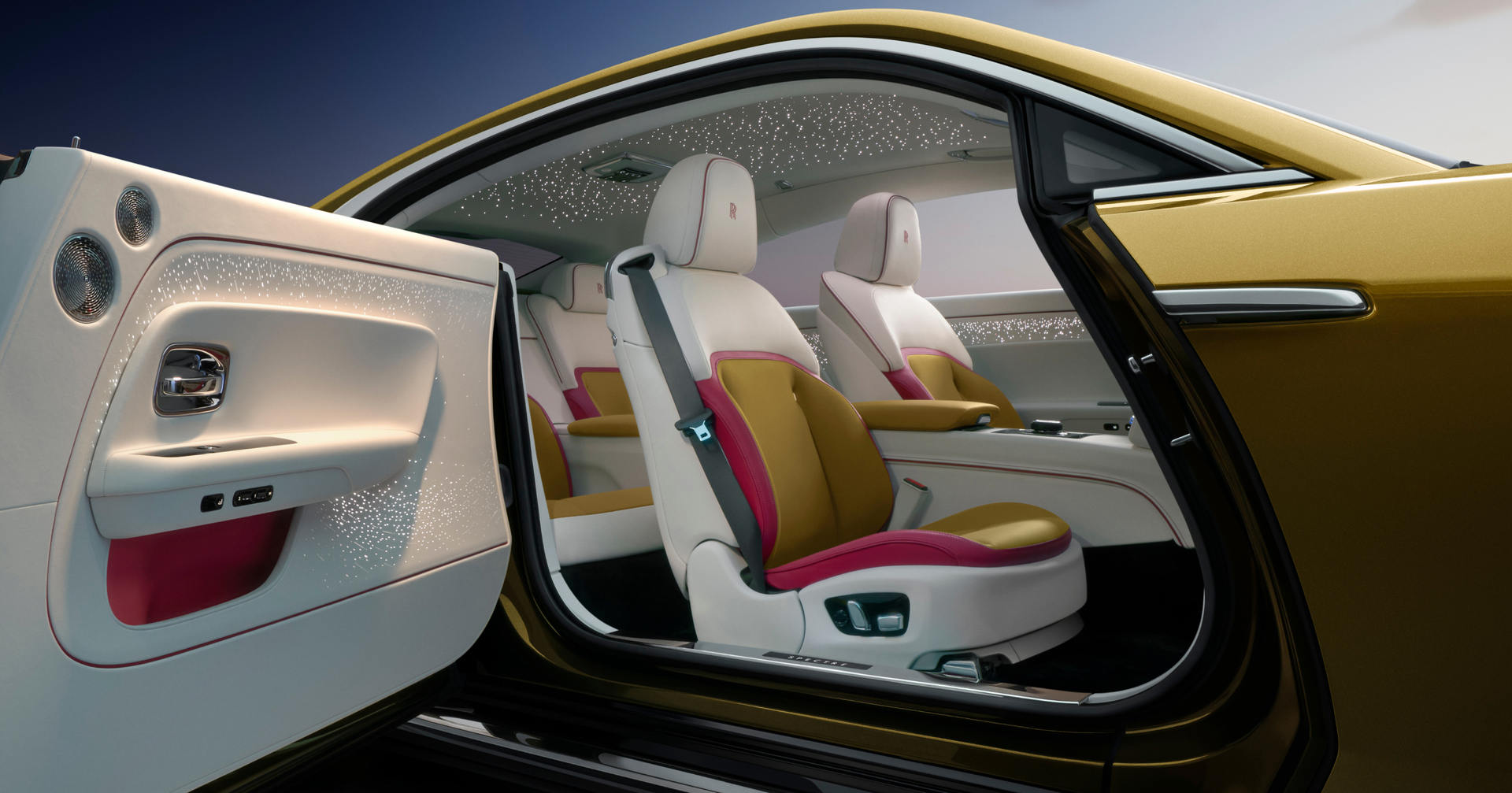 Interior shot of the gold Spectre showing the extravagant pink, gold, and white colour combination.