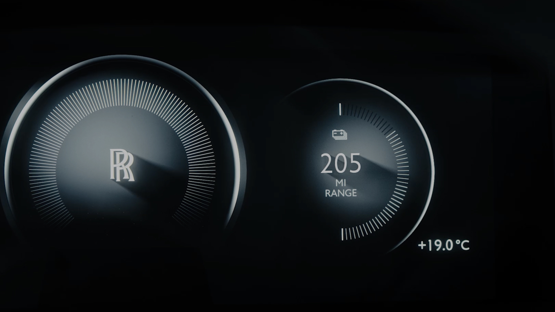 Spectre range dial, showing 205 mile range