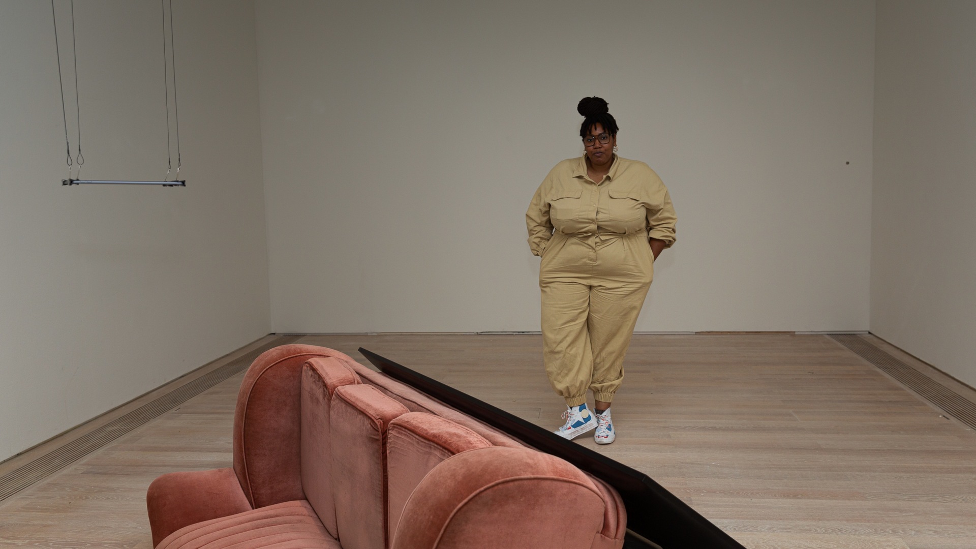 Artist Sondra Perry stands next to her installation work precursor to Lineage for a Phantom Zone 2022.